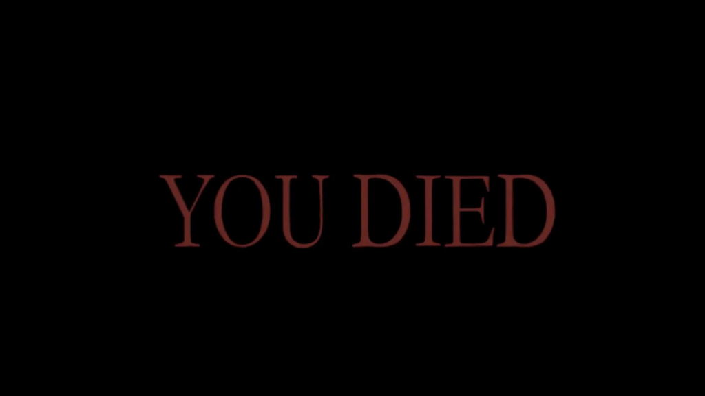 Screenshot from the Dark Souls video games. It reads "YOU DIED" in spooky red font on a black background.